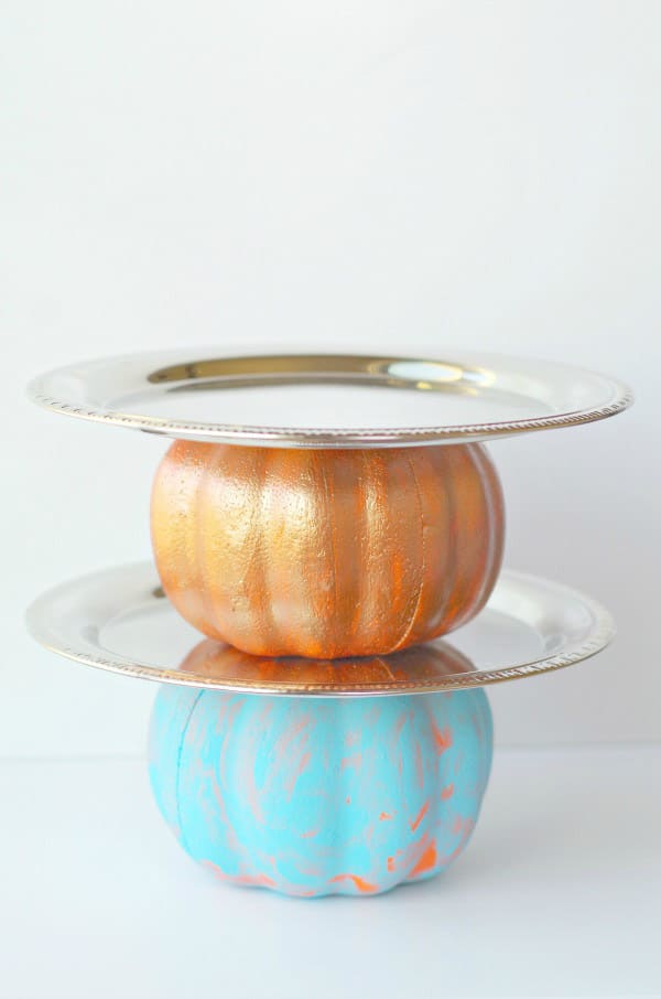 A DIY pumpkin cake stand is one of the cutest fall party decorations