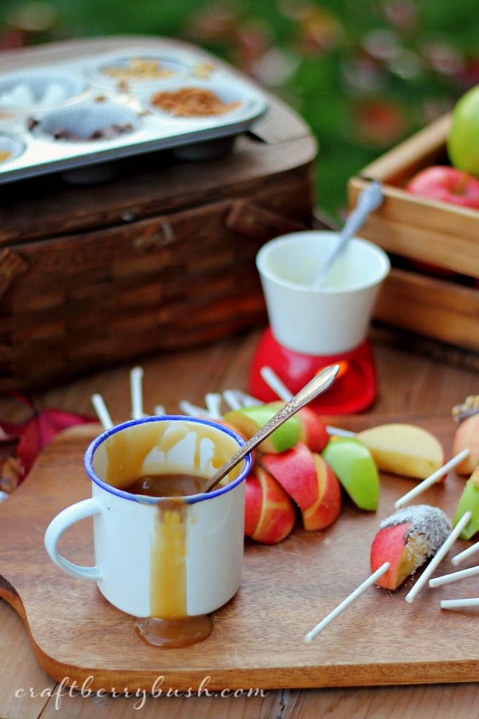 Setting up a caramel apple bar is one of the best fall party ideas