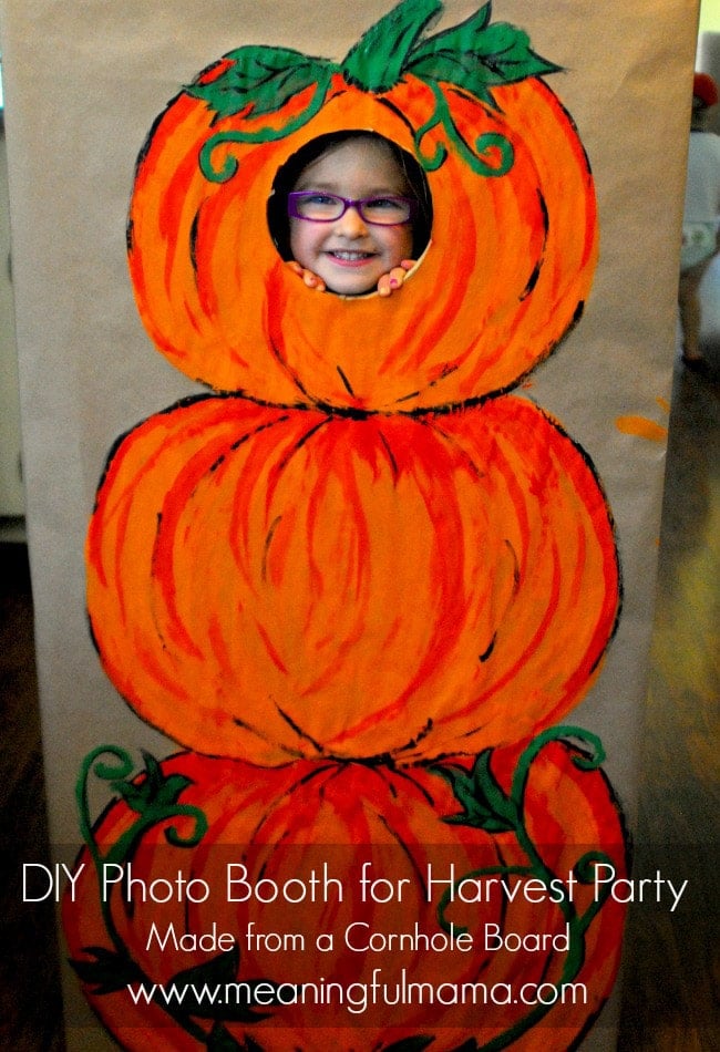 Skip the fall party games and do this pumpkin photo booth instead