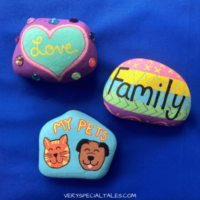 rocks painted with words on them