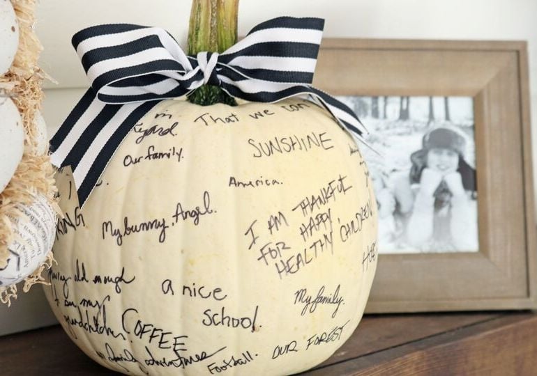 Pumpkin with things written on it