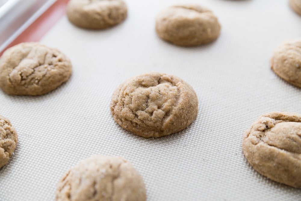 A tray full the cookies made from a molasses cookie recipe