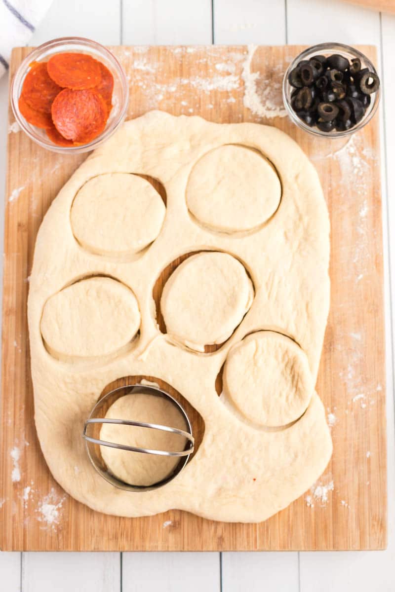 Cutting out calzone dough