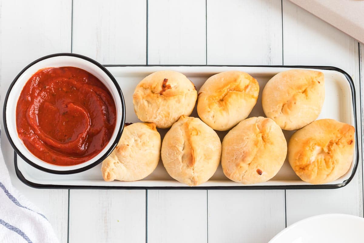 Calzone on a plate with sauce