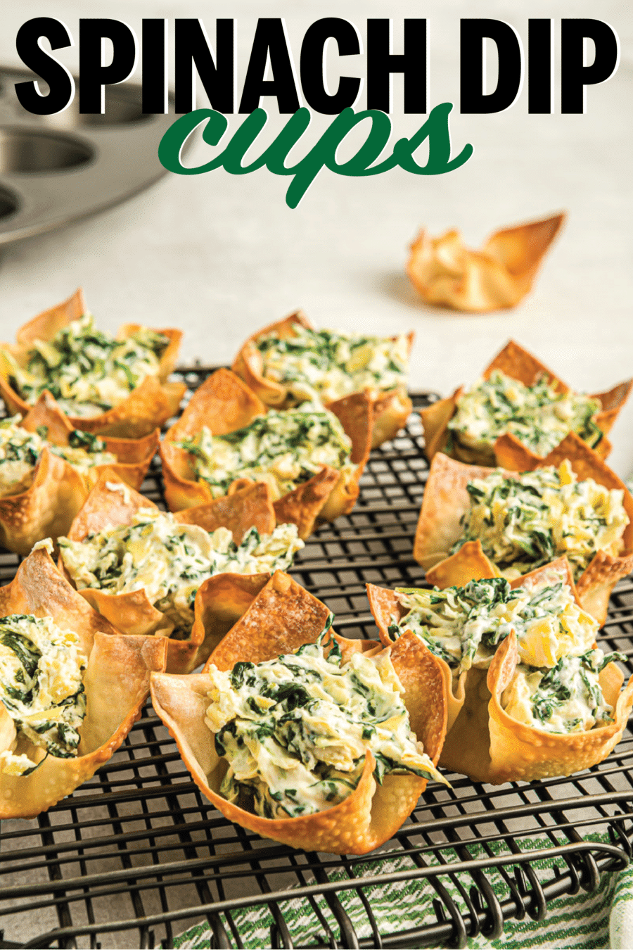 These easy spinach artichoke cups combine your favorite spinach artichoke dip with a crispy wonton cup! The perfect party food or easy appetizer for a dinner party!