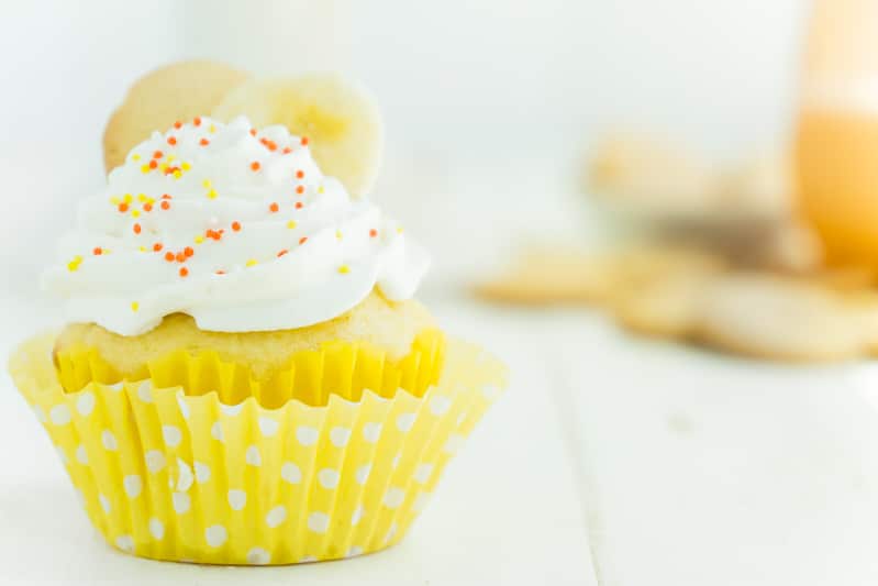 One banana pudding cupcake in a yellow cupcake wrapper