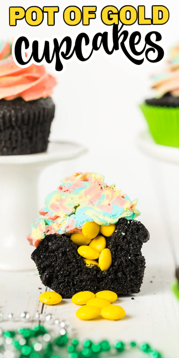 These St. Patrick's Day cupcakes are perfect for kids  and classroom parties! Black pot of gold cupcakes filled with gold and topped with rainbow frosting make these delicious and cute!