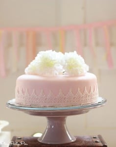 Lace wrapped cake perfect for a bridal shower from playpartyplan.com