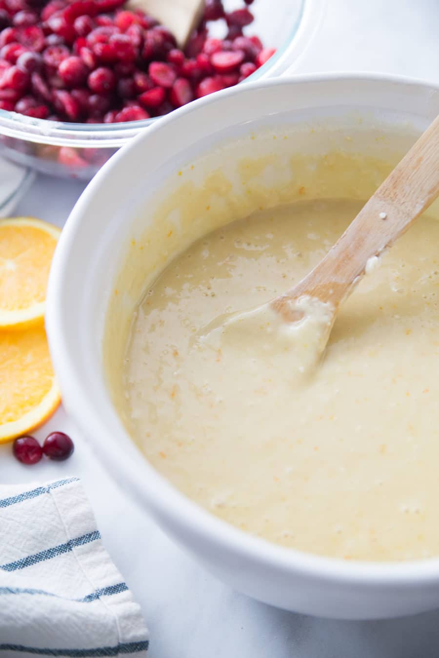 Stirring the batter for cranberry orange bread