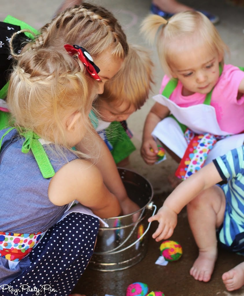 Have kids toss splash balls onto letters or numbers to make learning fun Have kids toss splash balls onto letters or numbers to make learning fun