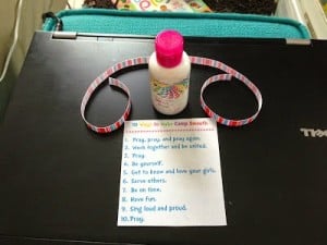 Small bottle of lotion with 10 ways to make girl's camp smooth