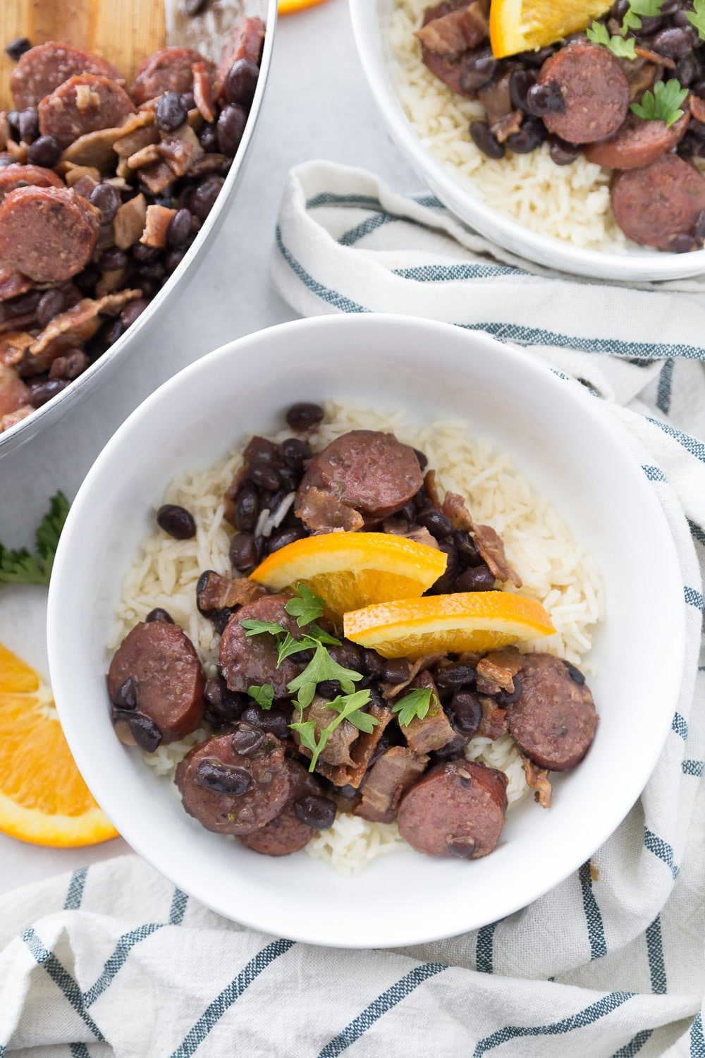 Top down view of two bowls of an easy feijoada recipe