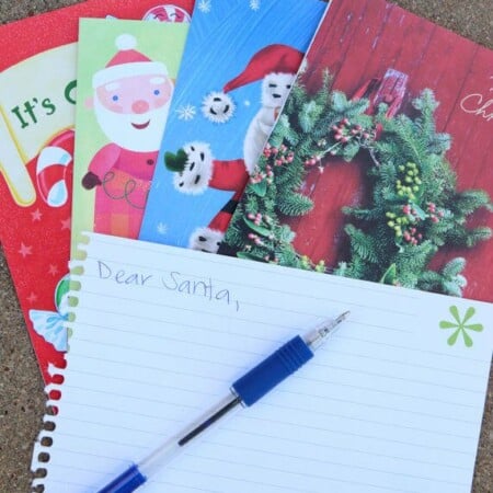 Dear Santa is a hilarious Christmas party game idea, make guests write a creative letter to Santa using just Christmas card captions