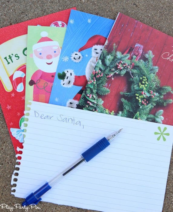 Dear Santa is a hilarious Christmas party game idea, make guests write a creative letter to Santa using just Christmas card captions