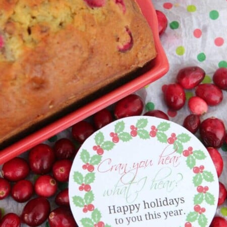 cranberry orange bread with a gift tag