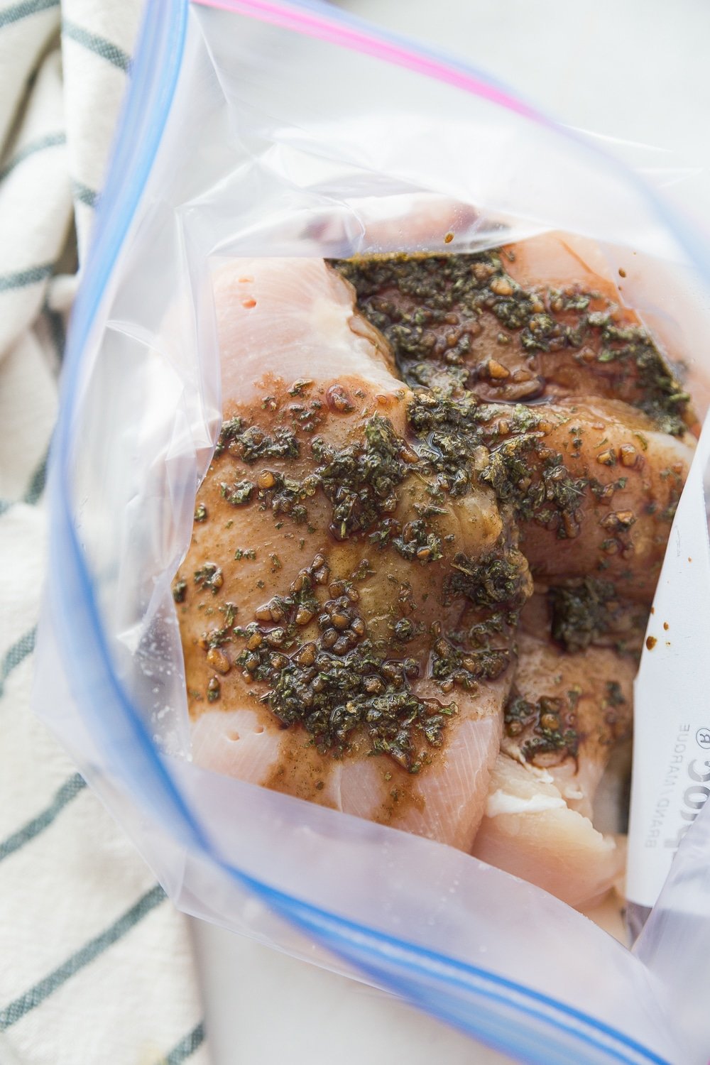 Chicken marinating in a balsamic chicken marinade