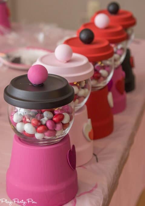 Valentine's Day bubble gum machines are such cute Valentine's Day crafts and perfect for this fun craft your heart out Valentine's Day party from www.playpartyplan.com.