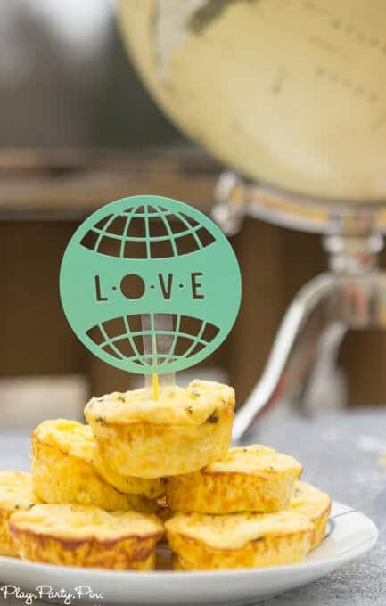 This love makes the world go round theme is perfect for a baby shower or a bridal shower, use round foods + world/travel items and you're all set for a shower everyone will love!