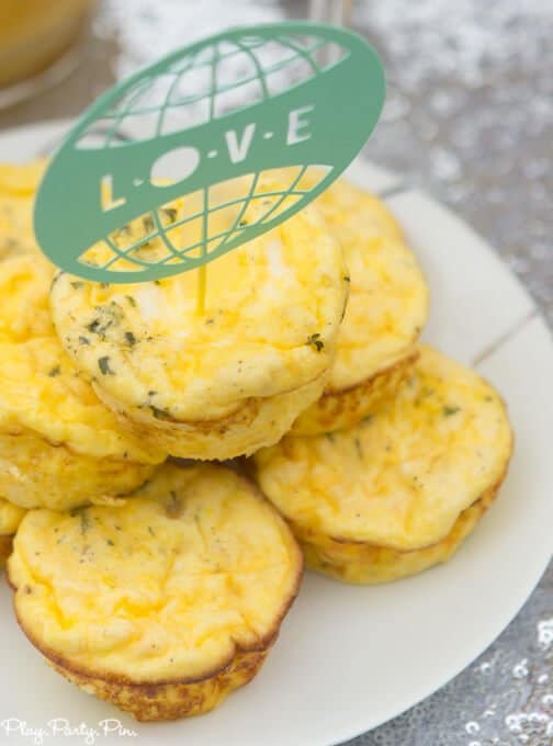 This love makes the world go round theme is perfect for a baby shower or a bridal shower, use round foods + world/travel items and you're all set for a shower everyone will love!