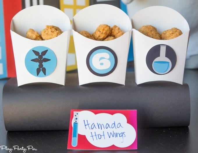 All sorts of fantastic Big Hero 6 party ideas including the easiest Baymax cupcake cake, awesome Fredzilla monster bars, and honey lemon cookies! Love everything about this Big Hero 6 movie night from www.playpartyplan.com. 