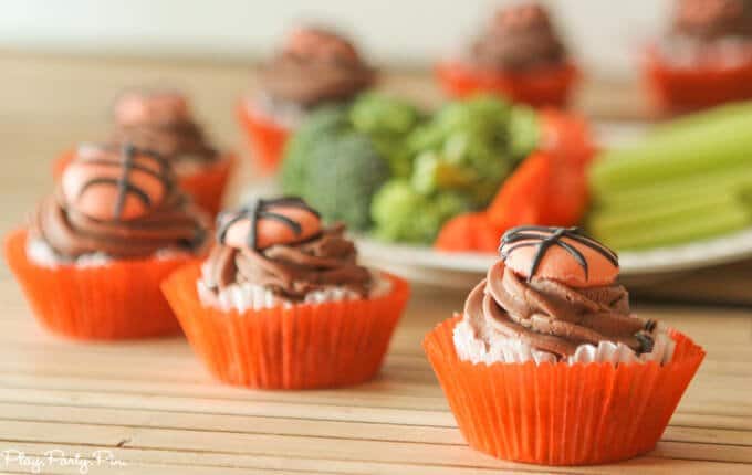 Chocolate Coke cupcakes with a chocolate buttercream and fondant basketballs on top