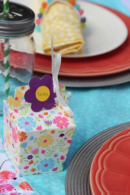 Gorgeous spring tablescape ideas, love the fabrics and jelly bean vases and napkin rings