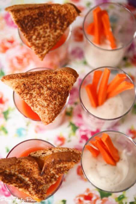 Grilled cheese with tomato shooters and veggie dip with carrot sticks, perfect party food ideas! 