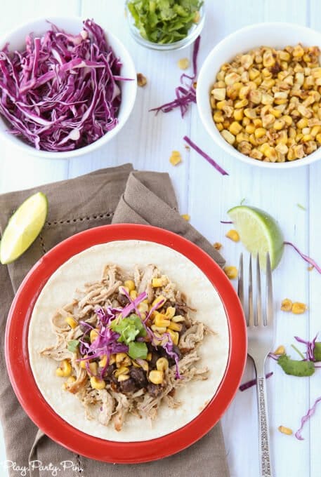 The most amazing pork taco recipe with a crockpot shredded pork and honey citrus cabbage