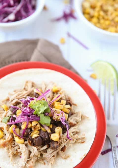 The most amazing pork taco recipe with a crockpot shredded pork and honey citrus cabbage