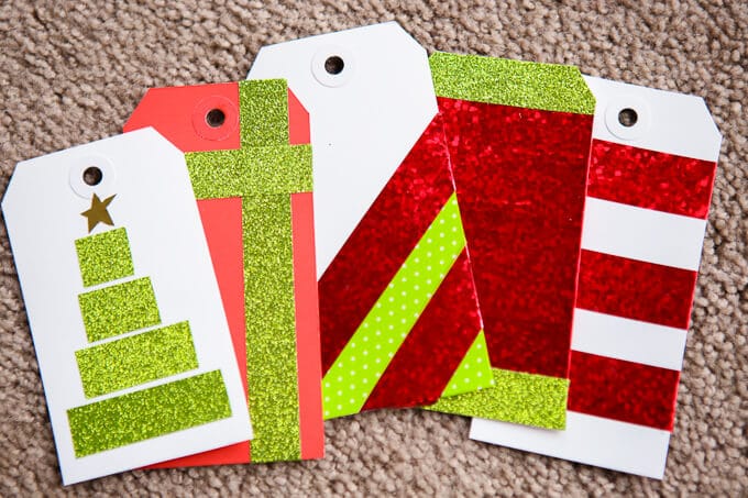 These Christmas gift tags are one of the easiest DIY crafts and they can go with any kind of wrapping paper! Even if you don’t have the best gift ideas, DIY your gift tags to turn not so great Christmas ideas into awesome gifts! Or if you don’t want to put them on gifts, wrap up a plate of cookies or cupcakes and add one of these tags. The Rudolph one is my favorite. 