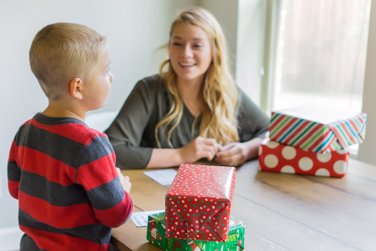 A white elephant gift exchange game decided by the flip of a coin