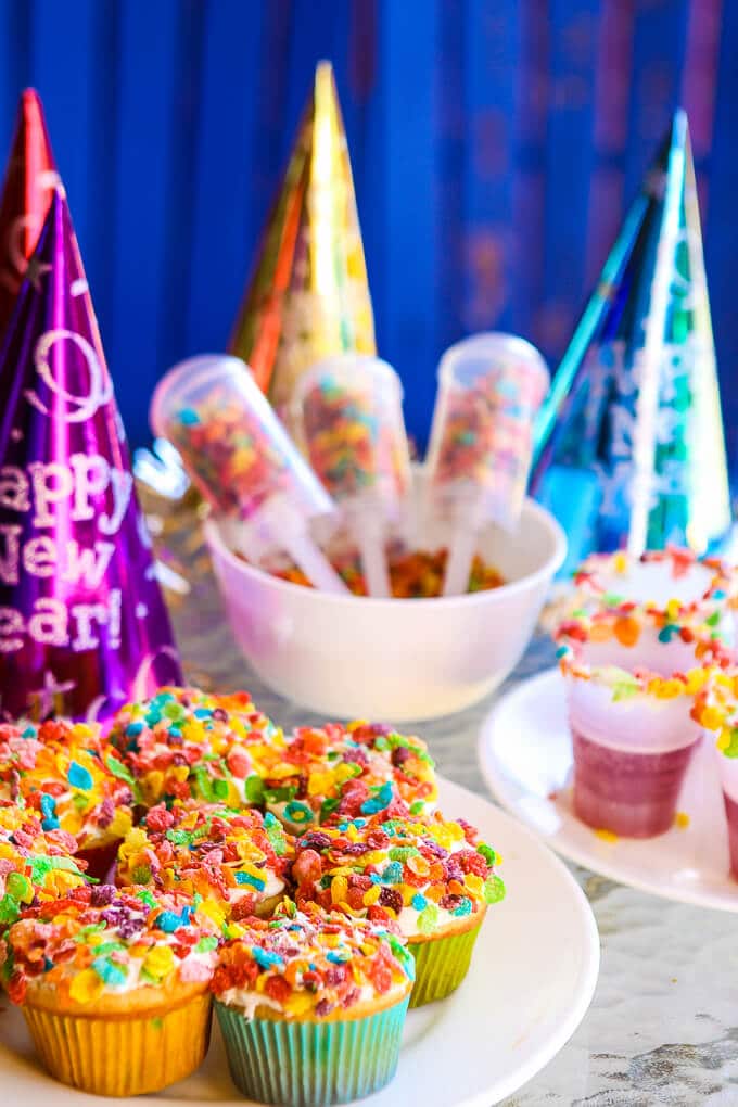 A Pop the Confetti party is perfect for New Year's Eve for kids! Simple DIY craft ideas, easy desserts, and yummy confetti looking food! Such fun New Year's Eve party ideas! I'm definitely doing this with with my toddler this year.