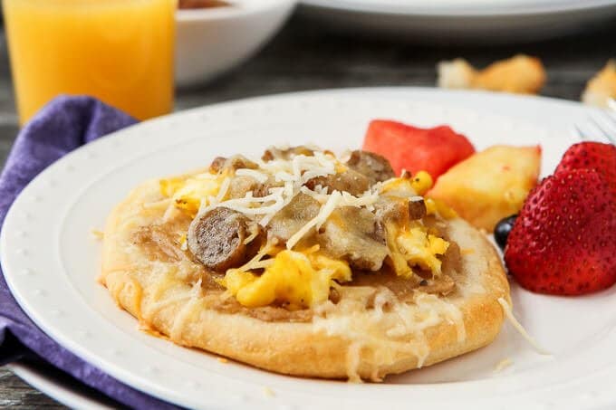 These biscuit and gravy breakfast pizzas are a super easy recipe and a perfect way to combine your favorite breakfast flavors into one recipe! They’d also make one yummy and easy dinner recipe. I’m definitely trying these with some maple syrup drizzled on top! 