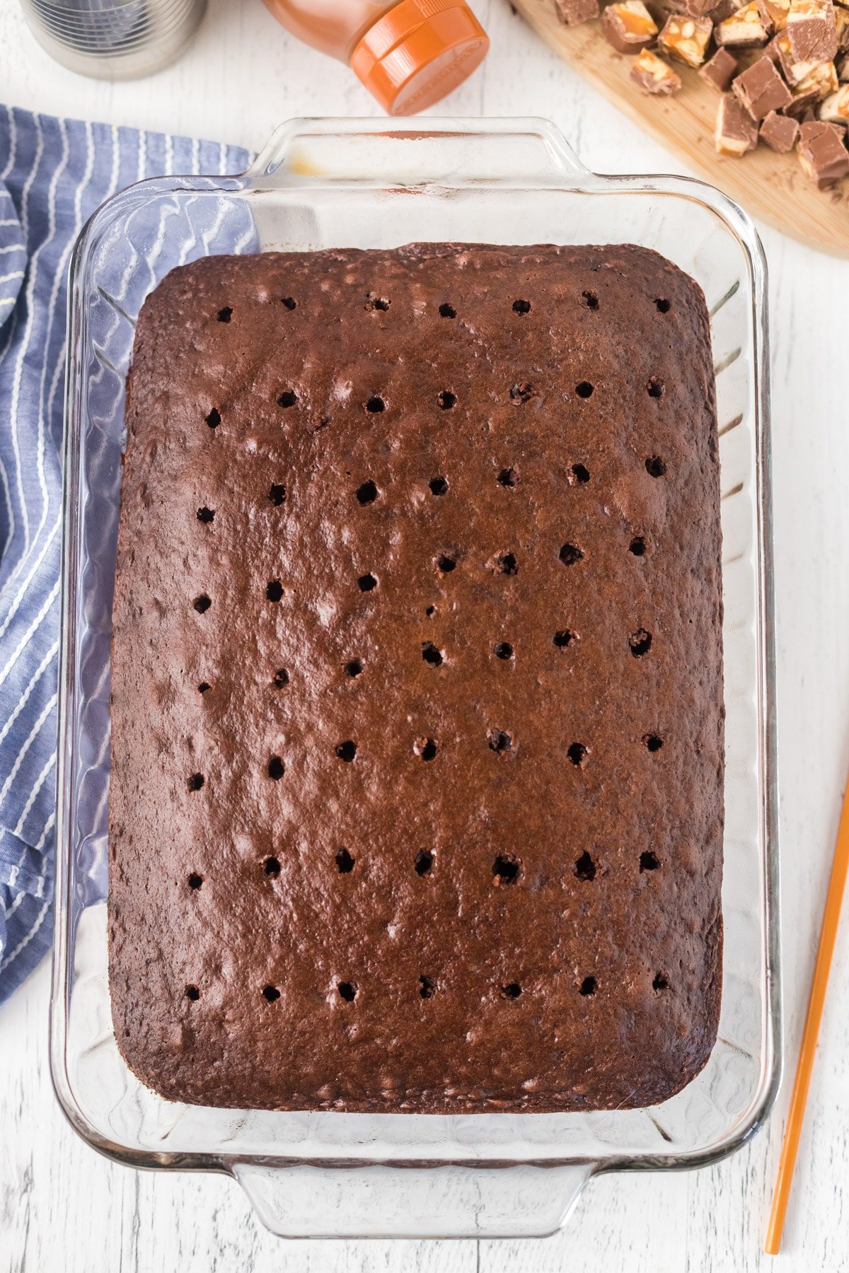 Chocolate cake with holes poked in it