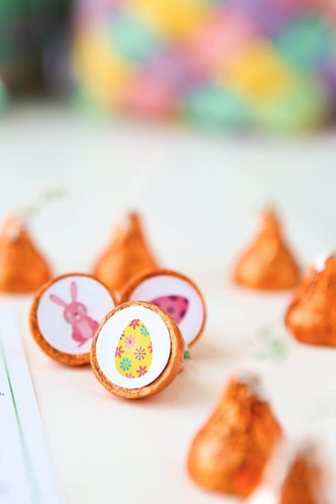 Free printable Easter party games that are perfect for kids of all ages! Print out the stickers, put them on the bottom of Hershey’s kisses, and play away! I can’t wait to try all three of these games with my kids! 