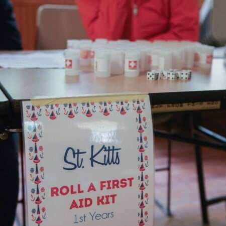 This roll a first aid kit is such a fun girls camp certification idea or even for girl scouts! Such a fun way to teach what goes in a basic first aid kit certification.