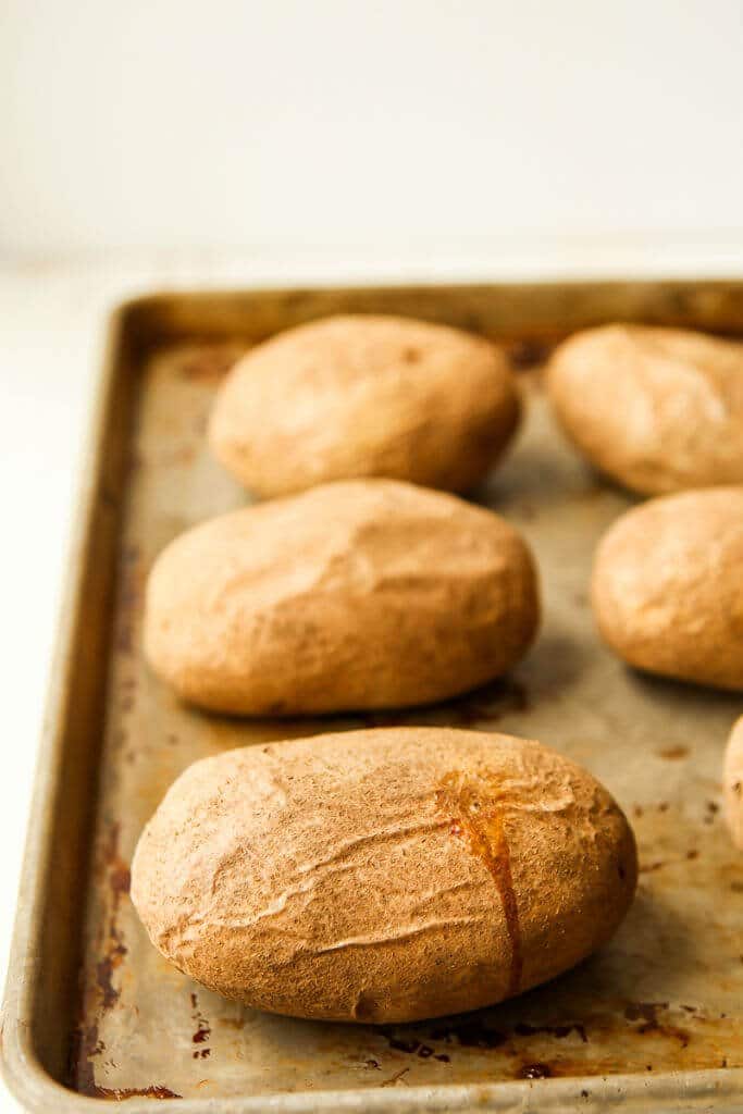 These creamy twice baked potatoes are the absolute best twice baked potatoes ever! They’re creamy, flavorful, and delicious! The perfect easy appetizers for a holiday brunch or dinner. 