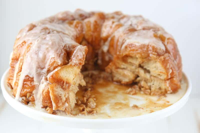 This pineapple monkey bread recipe is perfect for Easter brunch or even for a dessert on a baby shower dessert table! Since you make this monkey bread with canned biscuits and pineapple juice, it’s an easy monkey bread recipe that everyone can make! Definitely one of my favorite recipes for a pineapple cake and one of the easiest desserts or breakfast recipes ever!