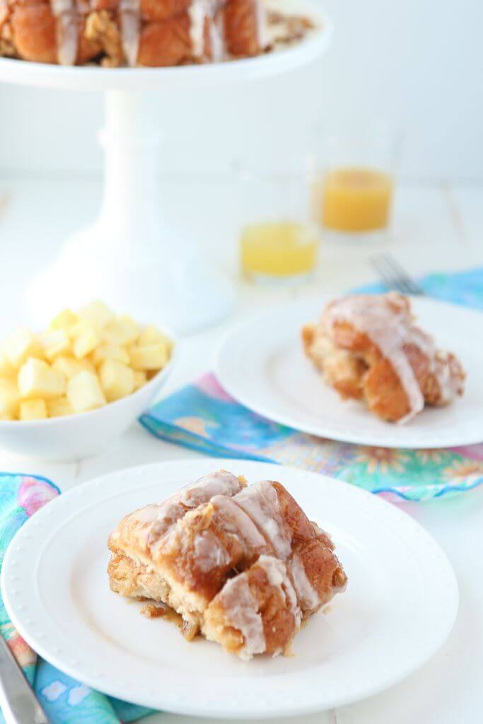 This pineapple monkey bread recipe is perfect for Easter brunch or even for a dessert on a baby shower dessert table! Since you make this monkey bread with canned biscuits and pineapple juice, it’s an easy monkey bread recipe that everyone can make! Definitely one of my favorite recipes for a pineapple cake and one of the easiest desserts or breakfast recipes ever!