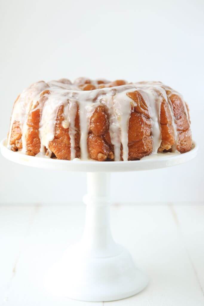 This pineapple monkey bread recipe is perfect for Easter brunch or even for a dessert on a baby shower dessert table! Since you make this monkey bread with canned biscuits and pineapple juice, it’s an easy monkey bread recipe that everyone can make! Definitely one of my favorite recipes for a pineapple cake and one of the easiest desserts or breakfast recipes ever!