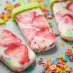 This homemade Fruity Pebbles funfetti popsicles recipe is a fun way to get kids to eat fruit and yogurt during the summertime. They’re the perfect healthy alternative to the other treats your kids will be craving on a hot summer day. And bonus, they’re healthy and on a stick. I mean, who doesn’t love anything on a stick? Perfect to DIY with your kids then enjoy as a family.