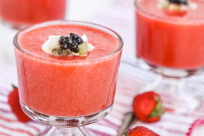 This strawberry soup tastes almost like a melted smoothie except better. Such a simple and easy recipe that uses fresh strawberries to create a healthy dessert option. Definitely one of the most unique strawberry ideas and perfect for summer entertaining! 