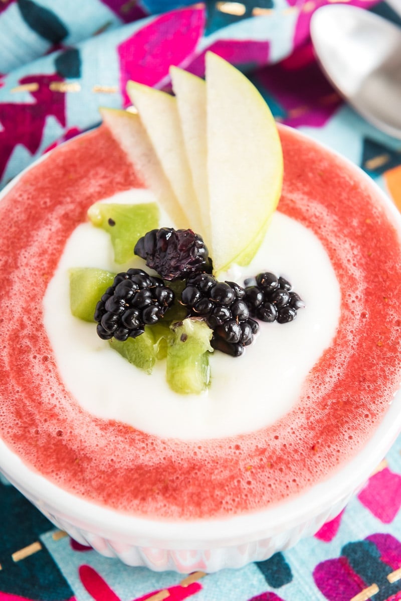 Strawberry soup with fruit on top