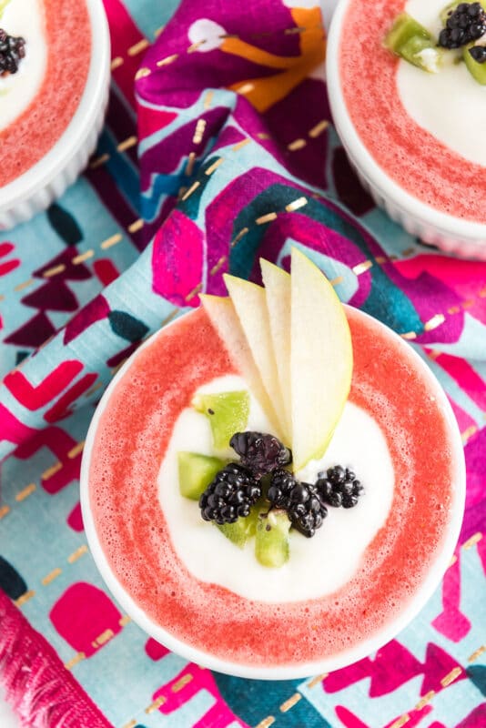 Three bowls of chilled strawberry soup