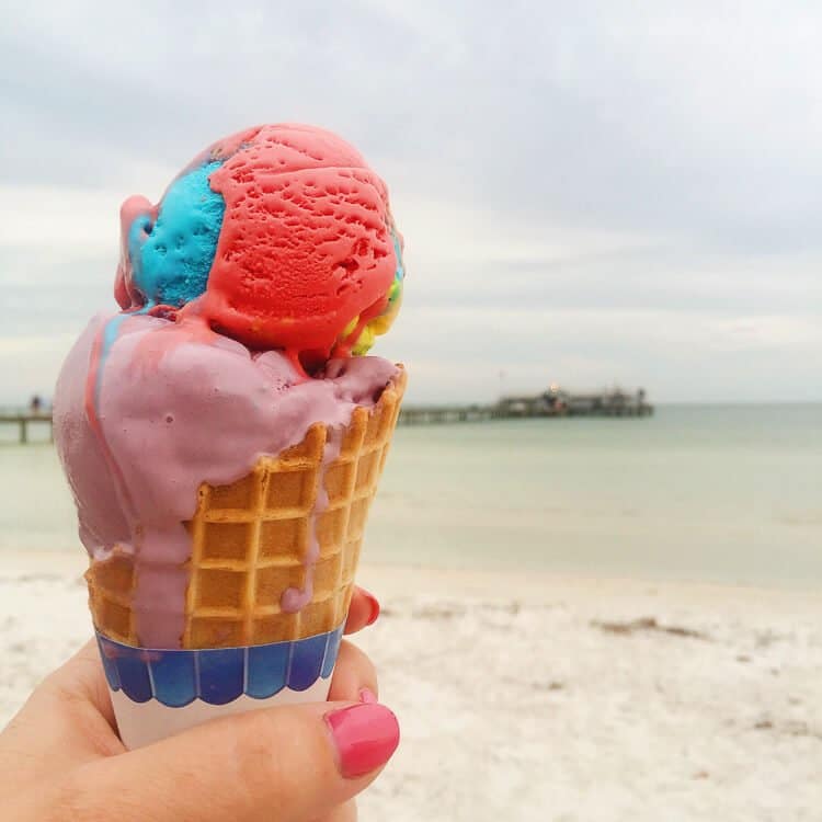 Woman's hand holding an ice cream cone