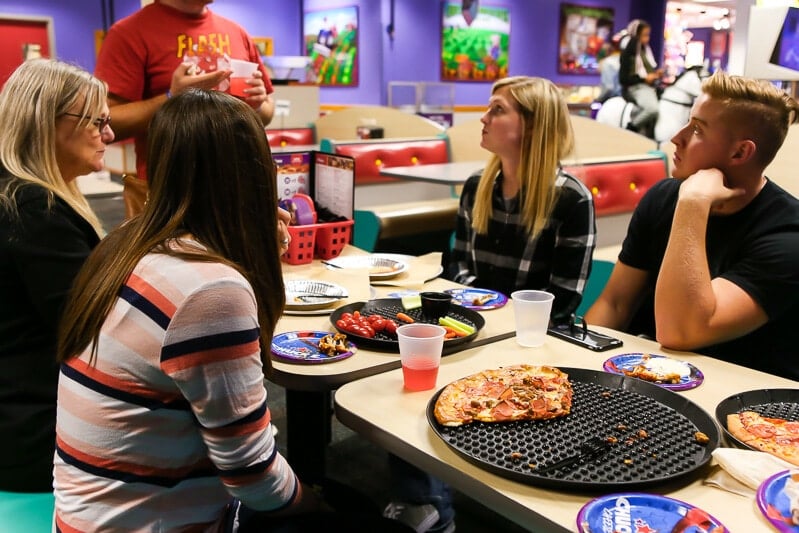 Enjoying food from the Chuck E Cheese menu at a Chuck E Cheese birthday