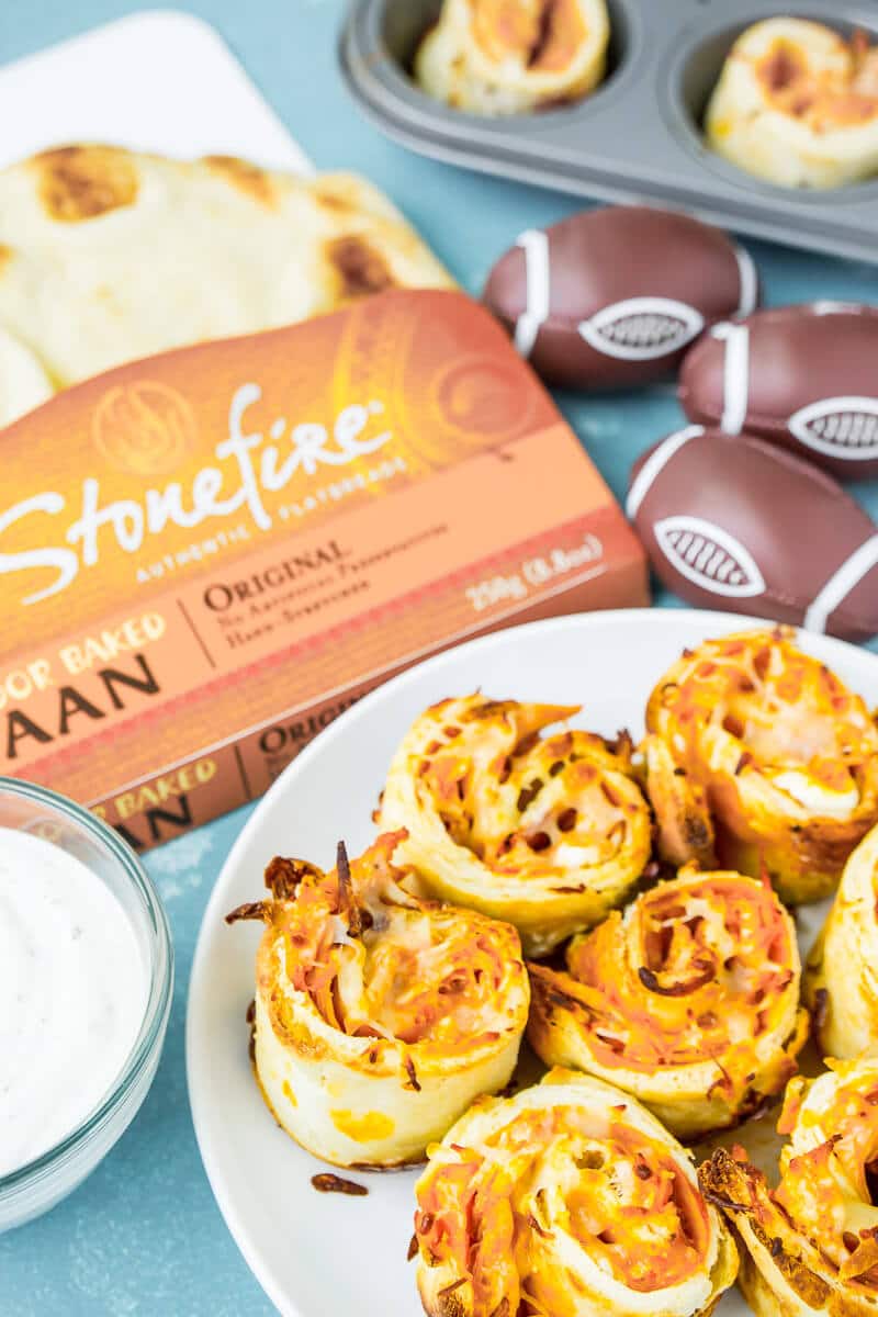 These buffalo chicken dip rollups combine buffalo chicken dip and a crisp naan exterior for the perfect game day food!