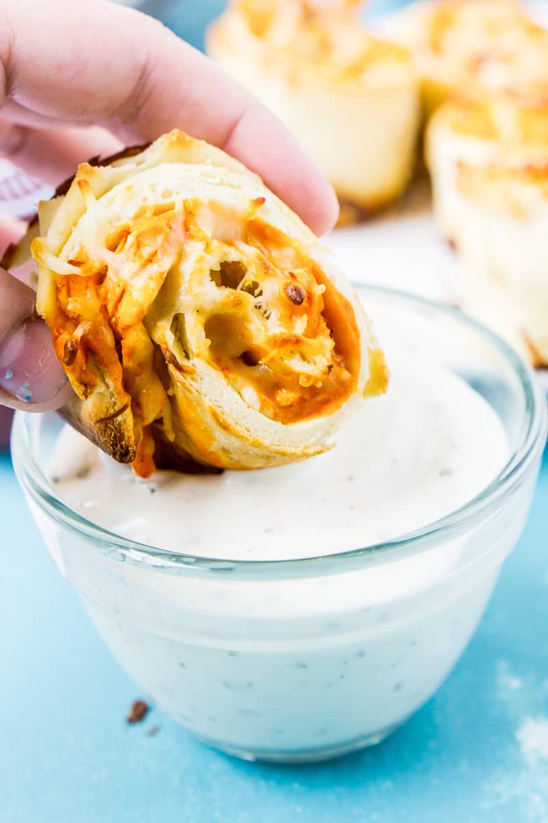 These buffalo chicken dip rollups combine buffalo chicken dip and a crisp naan exterior for the perfect game day food!