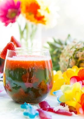 This easy mocktail recipe is inspired by Te Fiti in the movie Moana. With a little sweet strawberry puree mixed with tropical juices, it's the best mocktail for all ages!