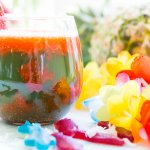 This easy mocktail recipe is inspired by Te Fiti in the movie Moana. With a little sweet strawberry puree mixed with tropical juices, it's the best mocktail for all ages!